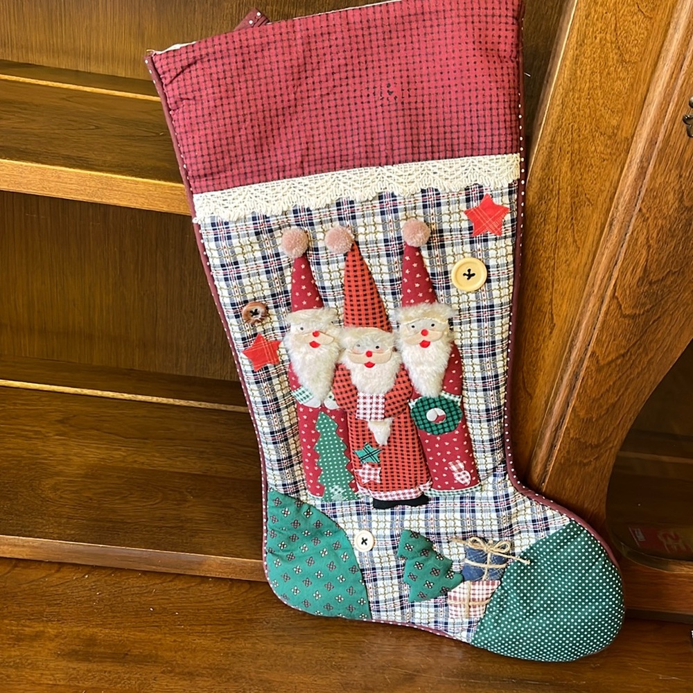 Vintage Christmas stocking with 3 Santa’s gently used condition